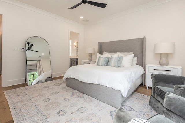 7066 Allelon Cir N, Germantown, TN 38138 - bedroom with light wood-type flooring, ornamental molding, recessed lighting, ensuite bathroom, and ceiling fan
