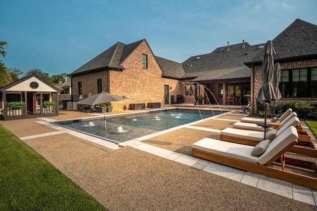 7066 Allelon Cir N, Germantown, TN 38138 - view of swimming pool featuring a patio and an outbuilding