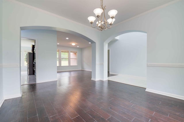 4560 Model Cv, Bartlett, TN 38002 - unfurnished room with arched walkways, wood finished floors, a chandelier, and ornamental molding