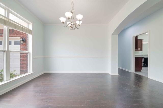 4560 Model Cv, Bartlett, TN 38002 - unfurnished room with dark wood finished floors, a chandelier, crown molding, and arched walkways