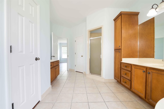 4560 Model Cv, Bartlett, TN 38002 - bathroom featuring a shower stall, two vanities, and tile patterned floors
