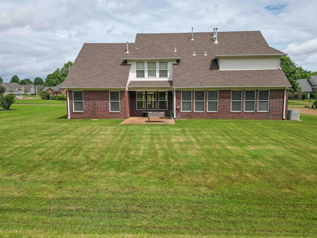 4560 Model Cv, Bartlett, TN 38002 - rear view of property with a patio, a shingled roof, a yard, and brick siding