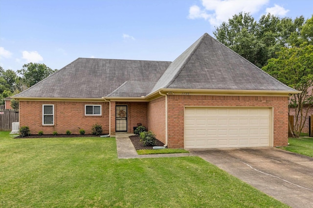 7725 Shadow Bend Ln, Bartlett, TN 38002 - view of front facade with brick siding, a garage, roof with shingles, and concrete driveway