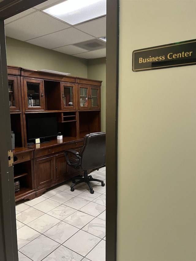 109 N Main St Unit 1202, Memphis, TN 38103 - office with built in study area, light tile patterned floors, and a drop ceiling