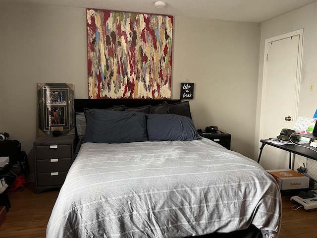 109 N Main St Unit 1202, Memphis, TN 38103 - bedroom featuring wood finished floors