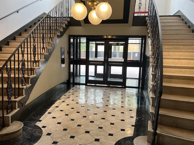 109 N Main St Unit 1202, Memphis, TN 38103 - foyer with stairway and baseboards