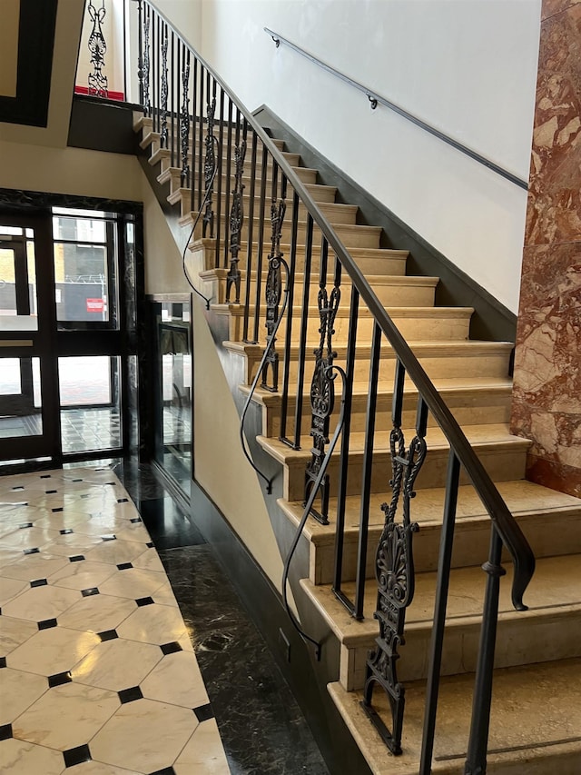 109 N Main St Unit 1202, Memphis, TN 38103 - stairs with a high ceiling