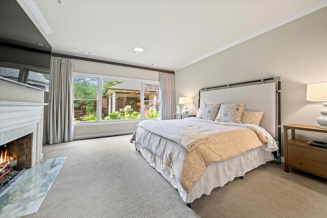 4654 Hemlock Ln, Memphis, TN 38117 - carpeted bedroom featuring crown molding and a fireplace