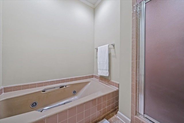 4654 Hemlock Ln, Memphis, TN 38117 - bathroom with a jetted tub, ornamental molding, and a shower stall