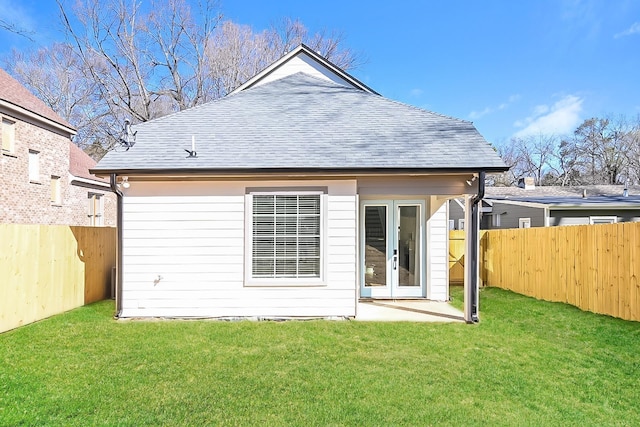 3615 Kearney Ave, Memphis, TN 38111 - back of house featuring a fenced backyard and roof with shingles