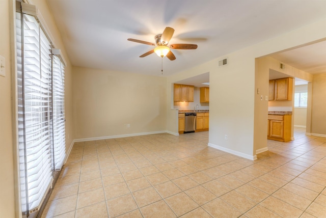 1841 Fernspring Cv Unit 26, Germantown, TN 38138 - unfurnished living room featuring ceiling fan and light tile patterned flooring