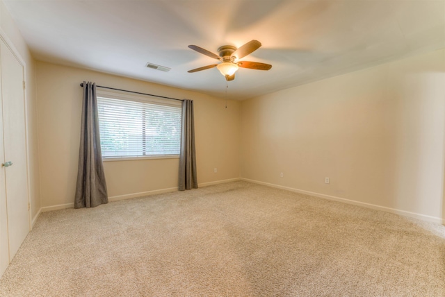 1841 Fernspring Cv Unit 26, Germantown, TN 38138 - empty room with ceiling fan and light colored carpet