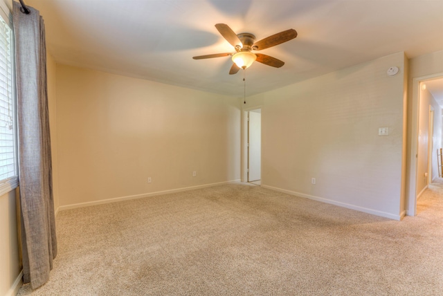 1841 Fernspring Cv Unit 26, Germantown, TN 38138 - spare room with light carpet and ceiling fan