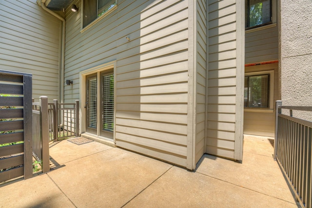 1841 Fernspring Cv Unit 26, Germantown, TN 38138 - view of exterior entry with a patio area