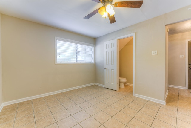 1841 Fernspring Cv Unit 26, Germantown, TN 38138 - unfurnished bedroom with light tile patterned floors and a ceiling fan