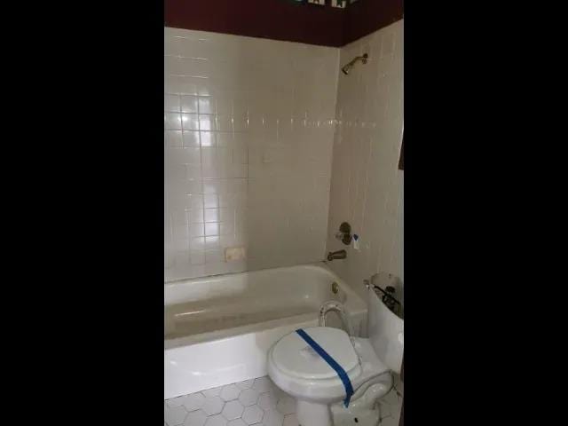 3394 Point Pleasant Ave, Memphis, TN 38118 - bathroom with tub / shower combination and tile patterned flooring