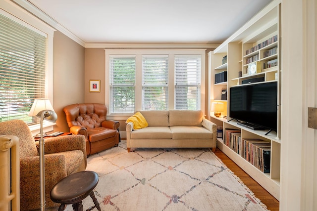 1668 Forest Ave, Memphis, TN 38112 - living area featuring crown molding and wood finished floors