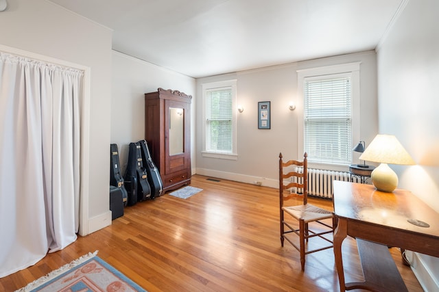 1668 Forest Ave, Memphis, TN 38112 - office space with radiator heating unit, light wood finished floors, and ornamental molding
