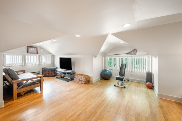 1668 Forest Ave, Memphis, TN 38112 - exercise area featuring vaulted ceiling, healthy amount of natural light, light wood-style flooring, and recessed lighting
