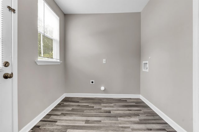 764 Garland St, Memphis, TN 38107 - laundry room featuring electric dryer hookup, wood finished floors, and washer hookup