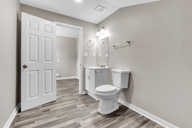 764 Garland St, Memphis, TN 38107 - bathroom featuring wood finished floors and vanity