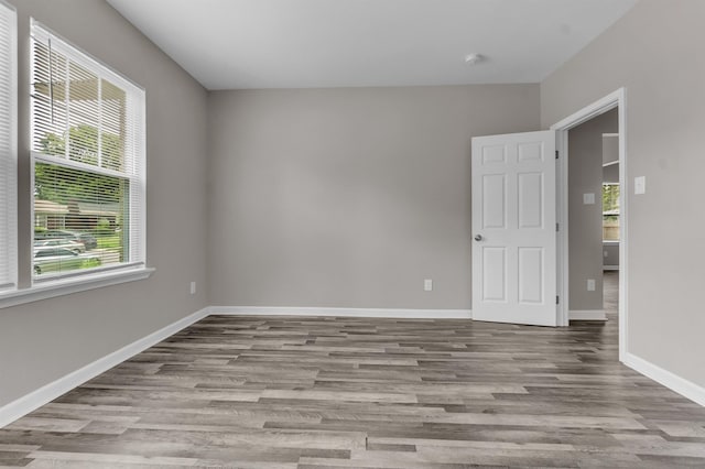 764 Garland St, Memphis, TN 38107 - unfurnished room featuring wood finished floors and a smoke detector