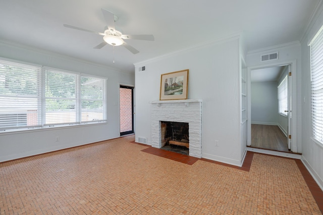 5208 Gwynne Rd, Memphis, TN 38117 - unfurnished living room featuring a fireplace, a ceiling fan, and crown molding