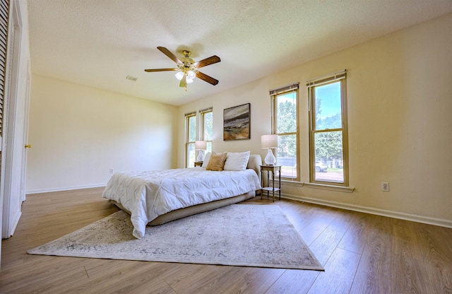 4447 Ross Rd, Memphis, TN 38141 - bedroom featuring wood finished floors and a ceiling fan
