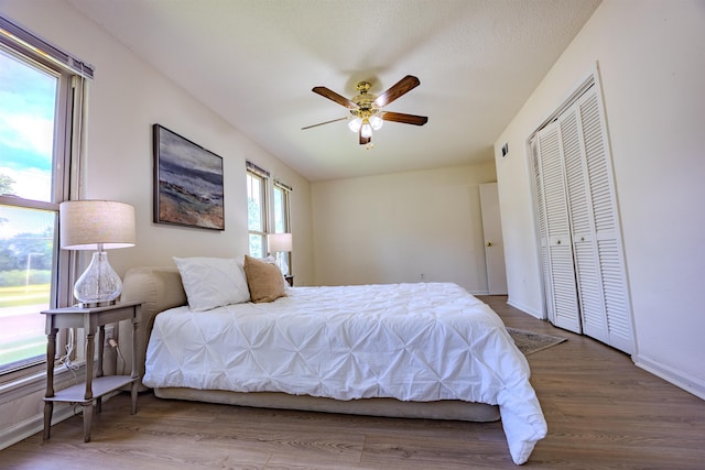 4447 Ross Rd, Memphis, TN 38141 - bedroom with wood finished floors and ceiling fan