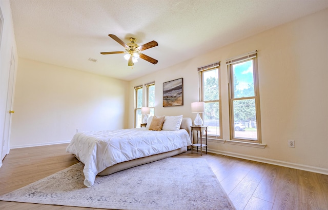 4447 Ross Rd, Memphis, TN 38141 - bedroom featuring wood finished floors and a ceiling fan