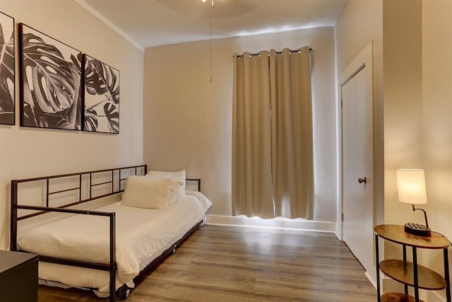 1680 Euclid Ave, Memphis, TN 38114 - bedroom with wood finished floors and ornamental molding