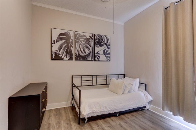 1680 Euclid Ave, Memphis, TN 38114 - bedroom featuring wood finished floors and crown molding