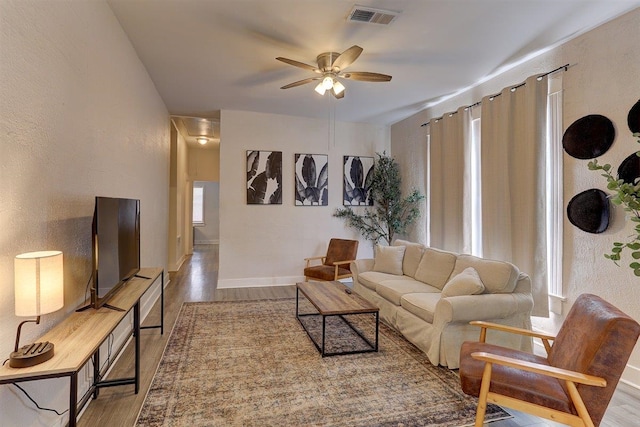 1680 Euclid Ave, Memphis, TN 38114 - living area with wood finished floors and ceiling fan