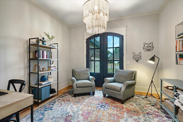 4342 Robinson Loop, Olive Branch, MS 38654 - sitting room with arched walkways, french doors, wood finished floors, a chandelier, and ornamental molding