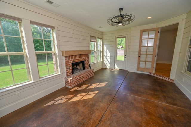 4342 Robinson Loop, Olive Branch, MS 38654 - unfurnished living room featuring a brick fireplace, finished concrete flooring, recessed lighting, and ceiling fan
