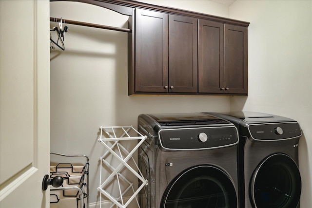 4342 Robinson Loop, Olive Branch, MS 38654 - laundry room featuring cabinet space and separate washer and dryer