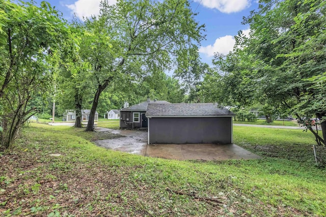 1017 Creston Ave, Memphis, TN 38127 - view of grassy yard with a patio