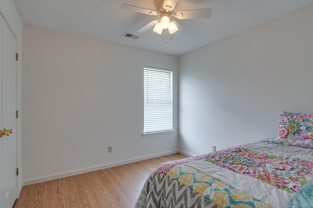 992 Zenith Cv N, Unicorp/Memphis, TN 38018 - bedroom featuring light wood-style flooring and a ceiling fan