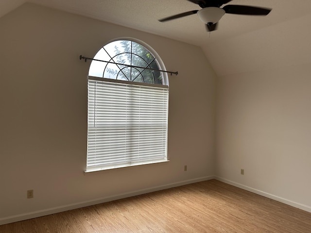 992 Zenith Cv N, Unicorp/Memphis, TN 38018 - spare room featuring light wood-type flooring, ceiling fan, and lofted ceiling