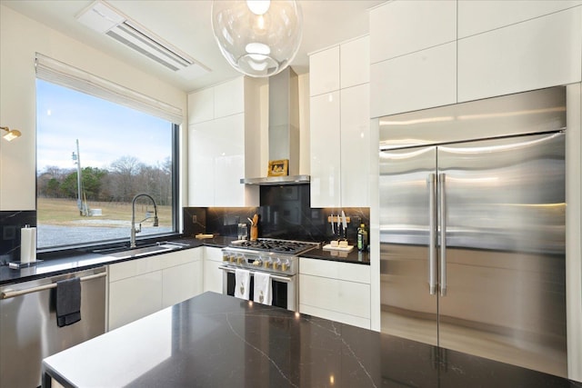 2270 Price Rd, Moscow, TN 38057 - kitchen featuring high quality appliances, white cabinetry, dark countertops, backsplash, and modern cabinets