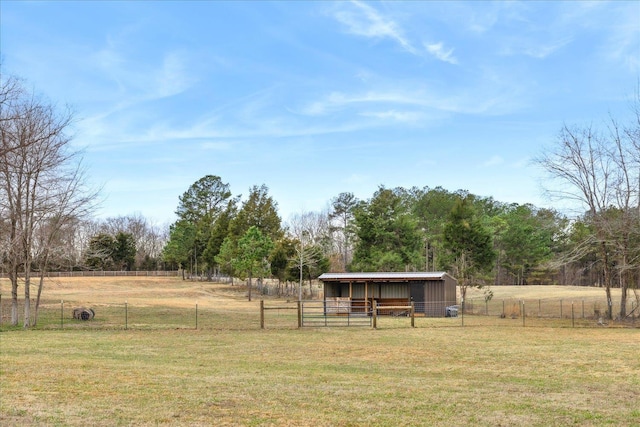 2270 Price Rd, Moscow, TN 38057 - view of green lawn featuring an outdoor structure, an exterior structure, and a pole building