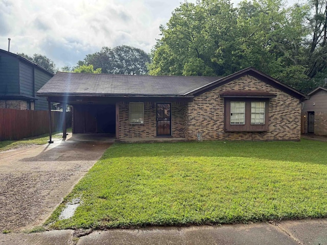 3612 Edgefield Dr, Memphis, TN 38128 - view of front of property featuring brick siding, driveway, and a carport