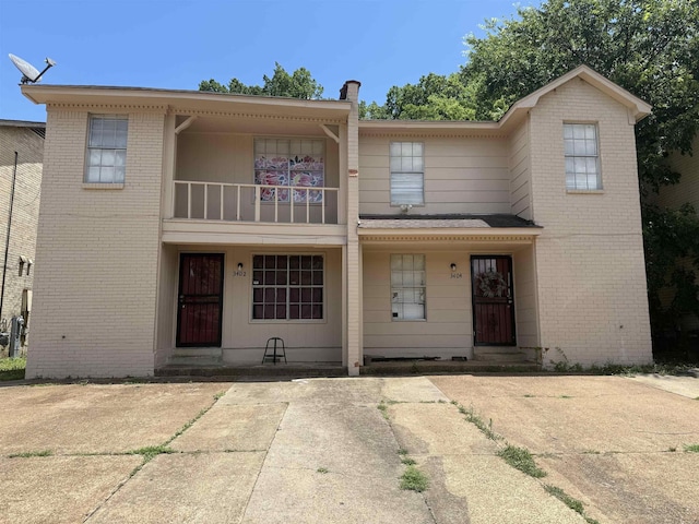 3402 Dungreen Dr, Memphis, TN 38118 - townhome / multi-family property with a balcony and brick siding