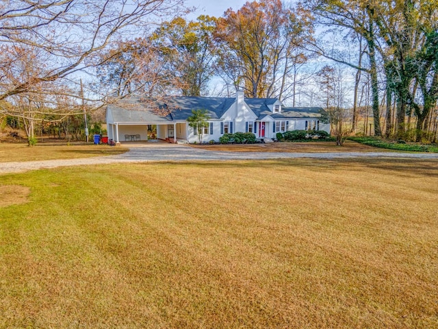 4950 Yum Yum Rd, Somerville, TN 38068 - view of front of home with driveway, a carport, a front lawn, and a chimney