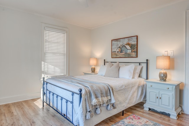 4950 Yum Yum Rd, Somerville, TN 38068 - bedroom with light wood-style flooring and ornamental molding
