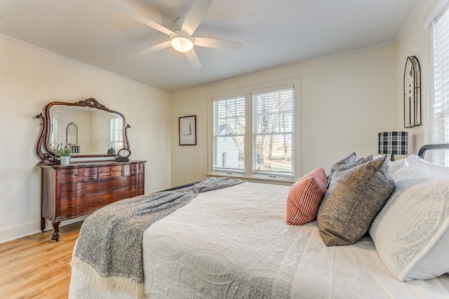 4950 Yum Yum Rd, Somerville, TN 38068 - bedroom featuring light wood-type flooring and a ceiling fan