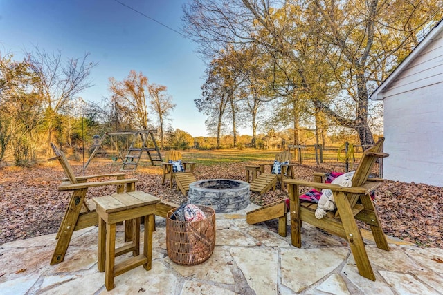 4950 Yum Yum Rd, Somerville, TN 38068 - view of patio / terrace with a fire pit and a playground