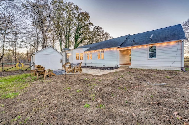 4950 Yum Yum Rd, Somerville, TN 38068 - rear view of house with a shingled roof and an outdoor structure