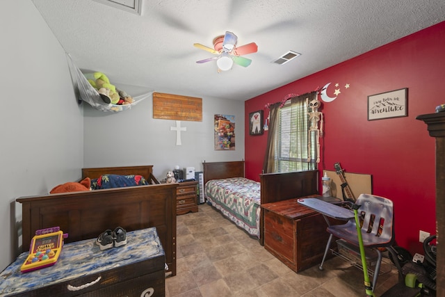 1635 Norton Rd, Middleton, TN 38052 - bedroom with a ceiling fan and a textured ceiling