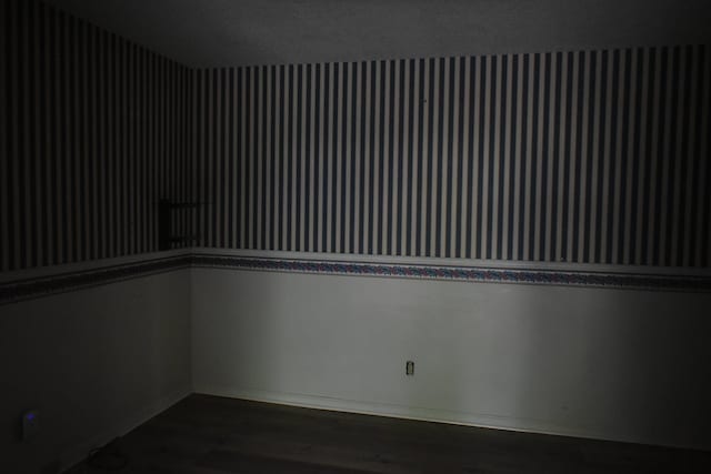 101 Bob St, Selmer, TN 38375 - spare room with dark wood-style floors